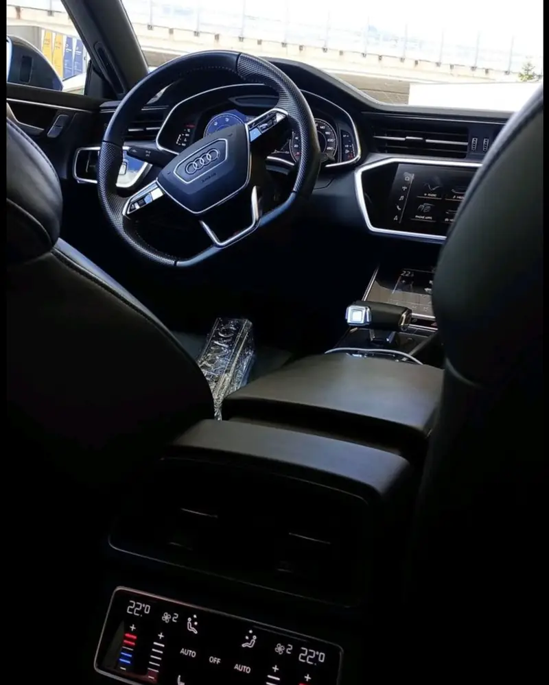 Rear seats of the Audi A6 with climate control and chargers