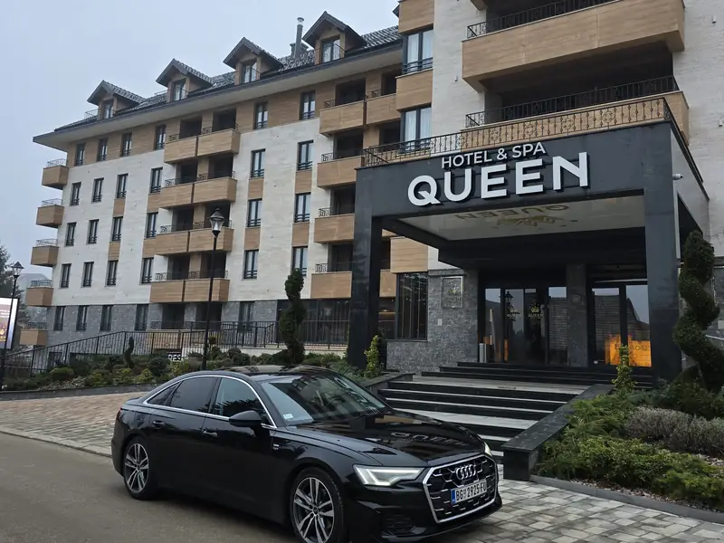 Audi A6 waiting outside a hotel in Belgrade