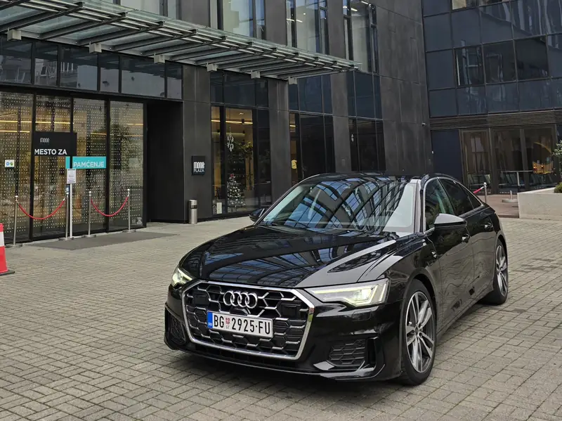 Audi A6 outside a hotel entrance in Belgrade